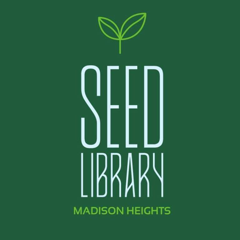 Seed Library text with image of plant